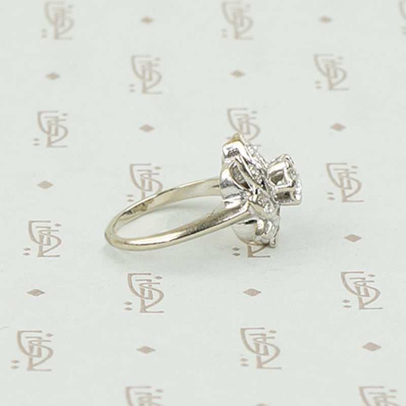Diamond and White Gold Pinwheel Ring
