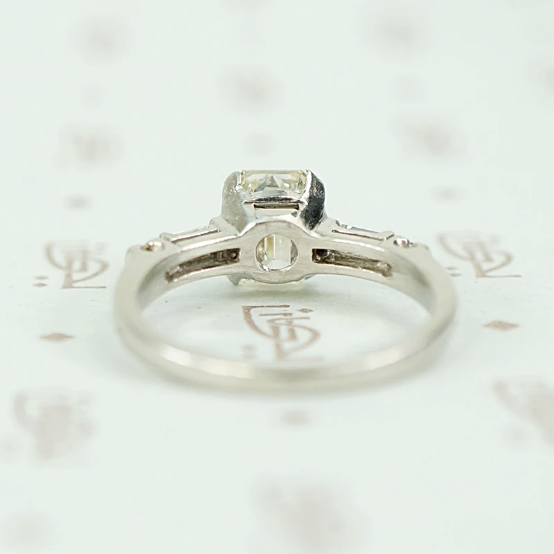 Exceptional Emerald Step Cut Diamond Engagement Ring