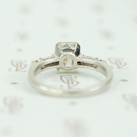 Exceptional Emerald Step Cut Diamond Engagement Ring