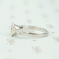 Exceptional Emerald Step Cut Diamond Engagement Ring