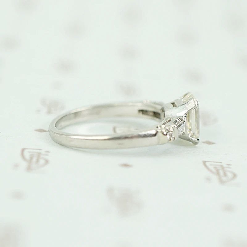 Exceptional Emerald Step Cut Diamond Engagement Ring