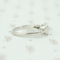 Exceptional Emerald Step Cut Diamond Engagement Ring