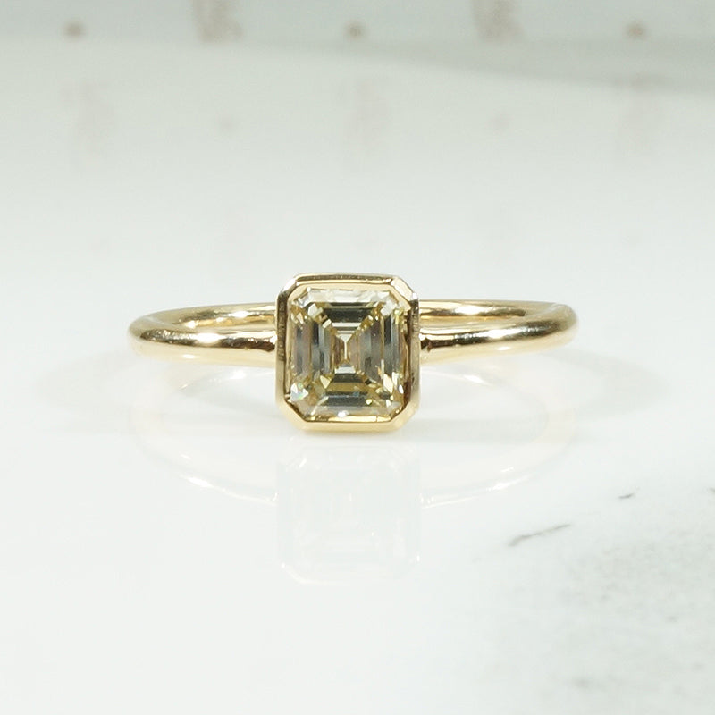 Pale Yellow Emerald Cut Diamond Solitaire