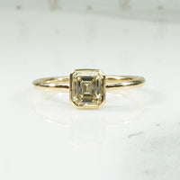 Pale Yellow Emerald Cut Diamond Solitaire