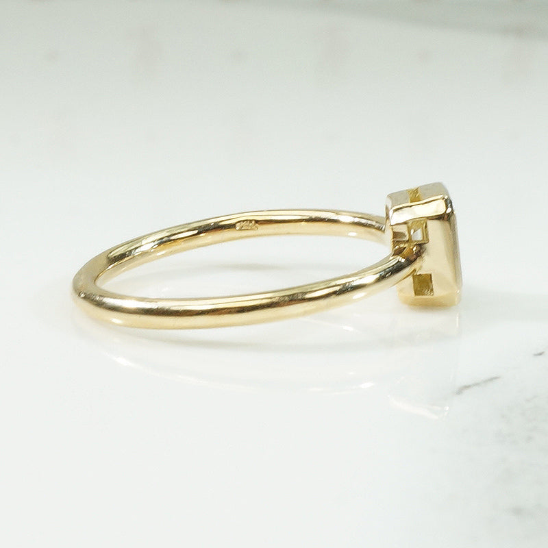 Pale Yellow Emerald Cut Diamond Solitaire