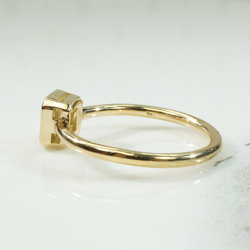 Pale Yellow Emerald Cut Diamond Solitaire