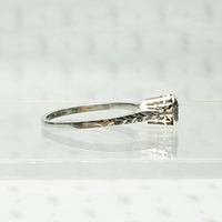 Otsby & Barton Diamond Solitaire with Herringbone Engraving, side view