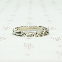 Crisp Art Deco White Gold Braided Band, profile view.