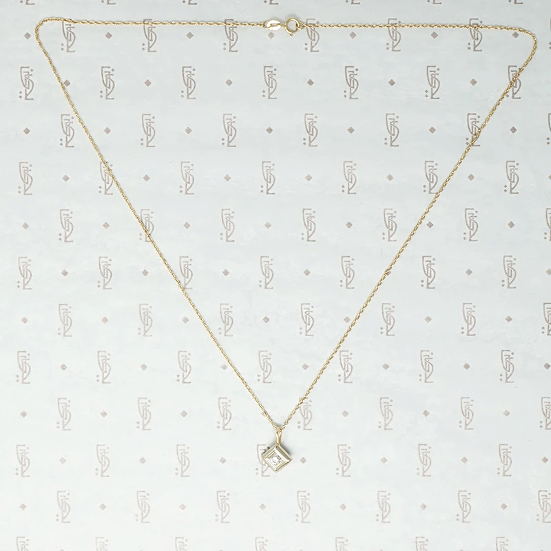 1920s Two Tone Gold and Diamond Pendant