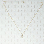 1920s Two Tone Gold and Diamond Pendant