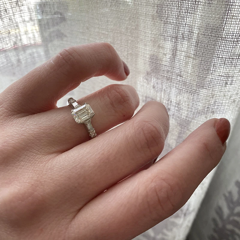 Exceptional Emerald Step Cut Diamond Engagement Ring
