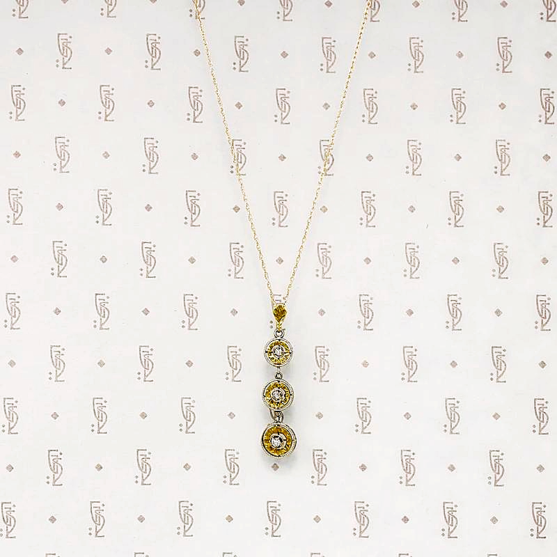 Cascading Pendant of Glittering Gold & Diamonds