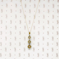 Cascading Pendant of Glittering Gold & Diamonds