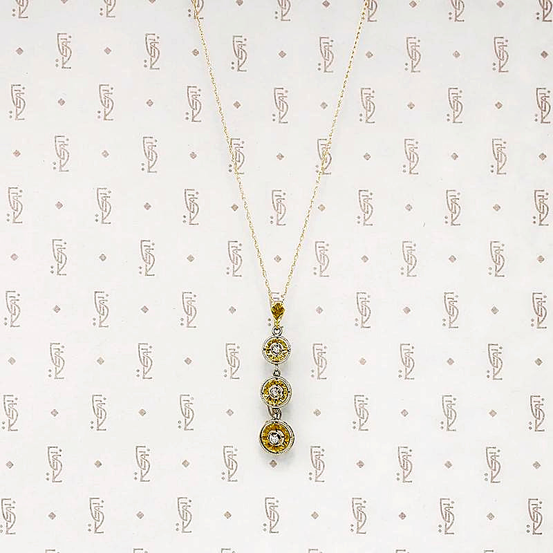 Cascading Pendant of Glittering Gold & Diamonds