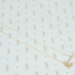 14k gold hatchet necklace back side