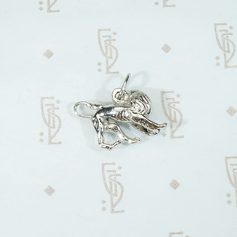 Heraldic Lion Statant Regardant Charm in Sterling
