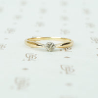 pinched shoulder platinum on gold champagne diamond solitaire