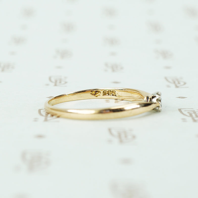 pinched shoulder platinum on gold champagne diamond solitaire