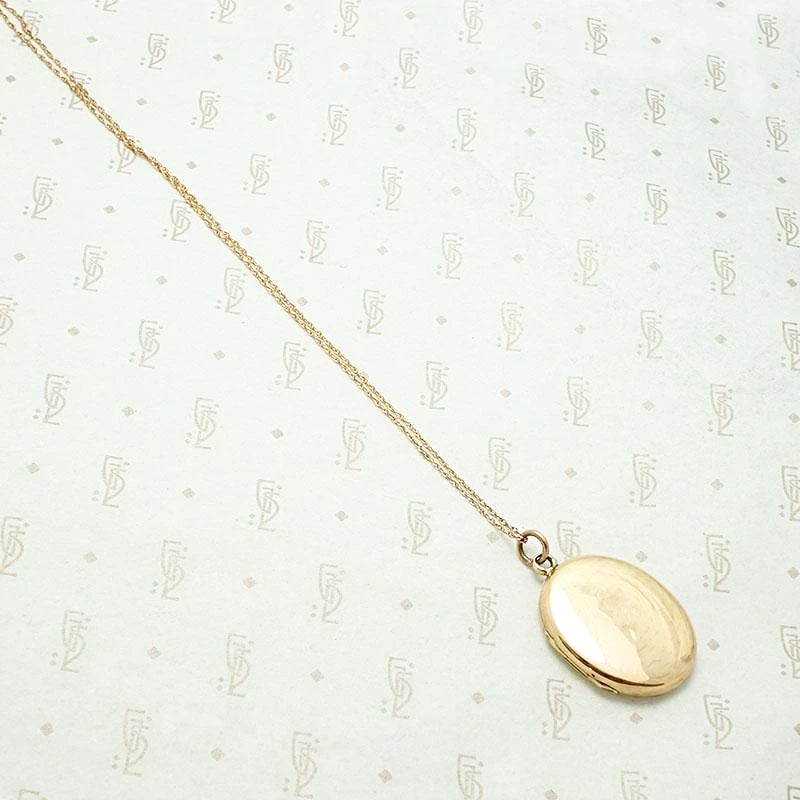 Elevated 18k Rose Gold Oval Locket