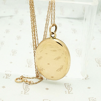 Elevated 18k Rose Gold Oval Locket