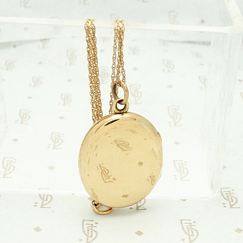 Elevated 18k Rose Gold Oval Locket