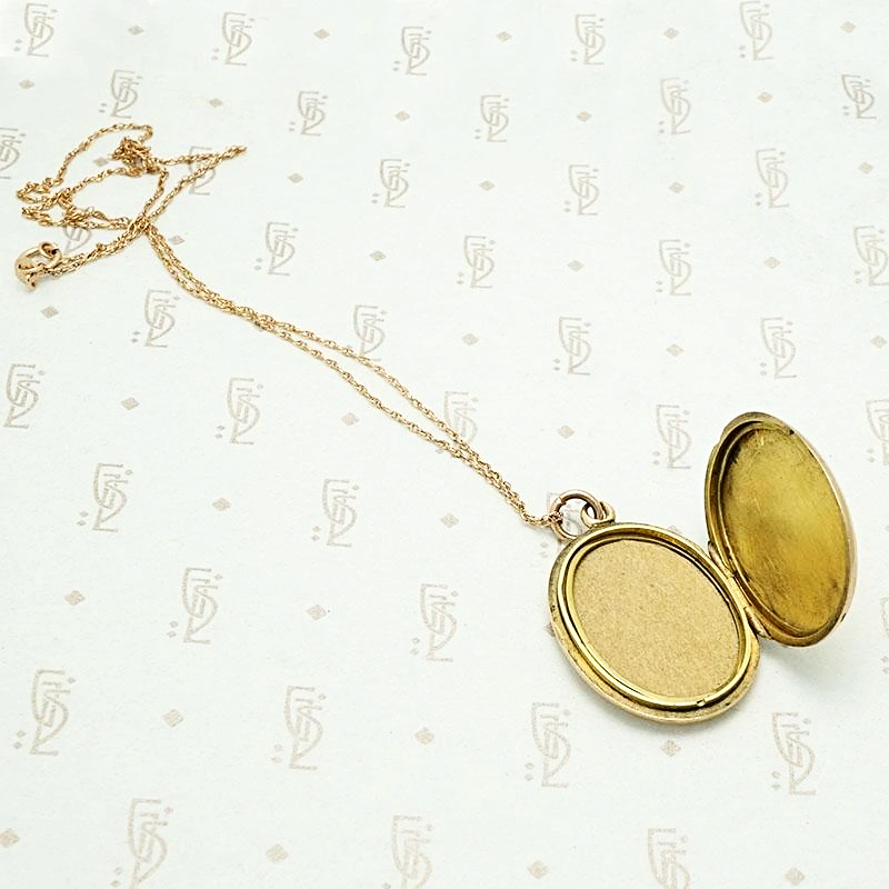Elevated 18k Rose Gold Oval Locket