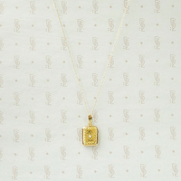 Delicate Gold Filigree Locket with Diamond Accent