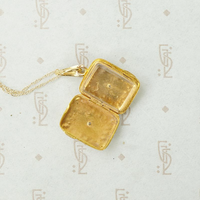 Delicate Gold Filigree Locket with Diamond Accent