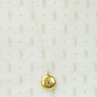 Luxurious Gold Locket with Ruby and Diamonds