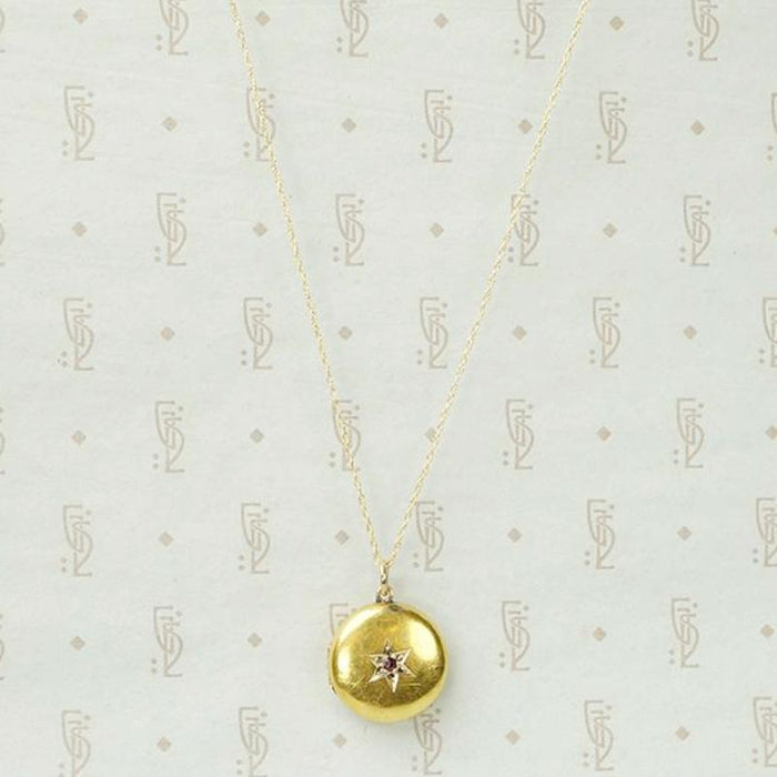 Luxurious Gold Locket with Ruby and Diamonds