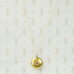 Luxurious Gold Locket with Ruby and Diamonds