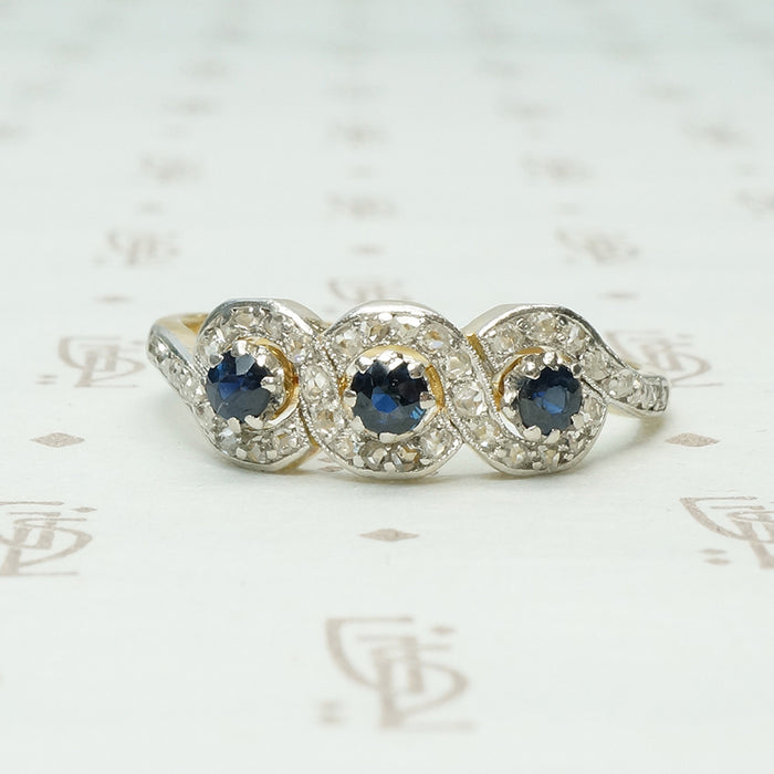 triple infinity sapphire and rose cut diamonf ring
