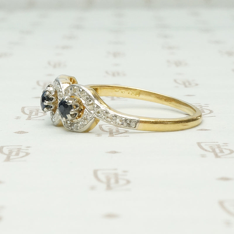 triple infinity sapphire and rose cut diamonf ring