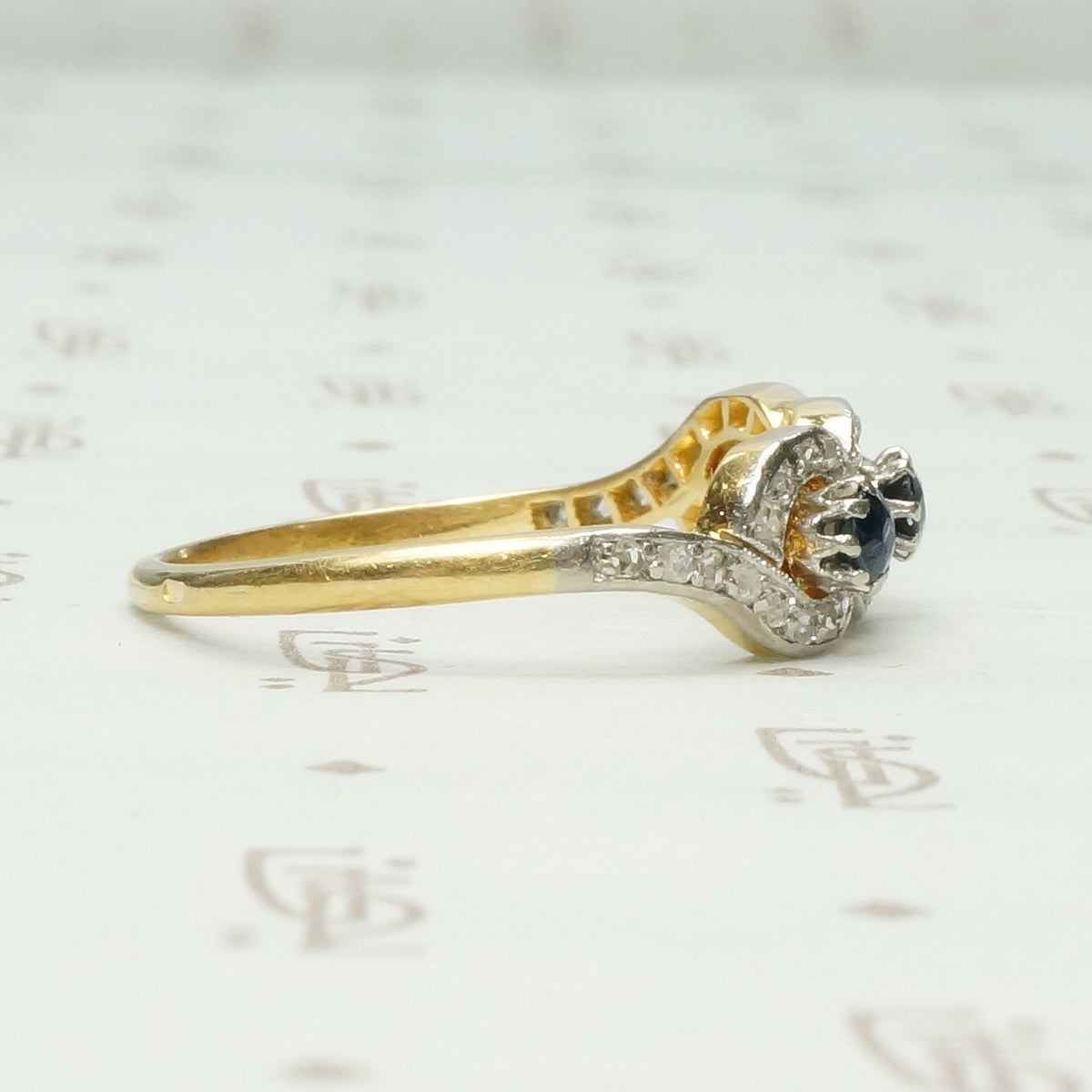 The French Triple Infinity Sapphire and Rose Cut Diamond Ring