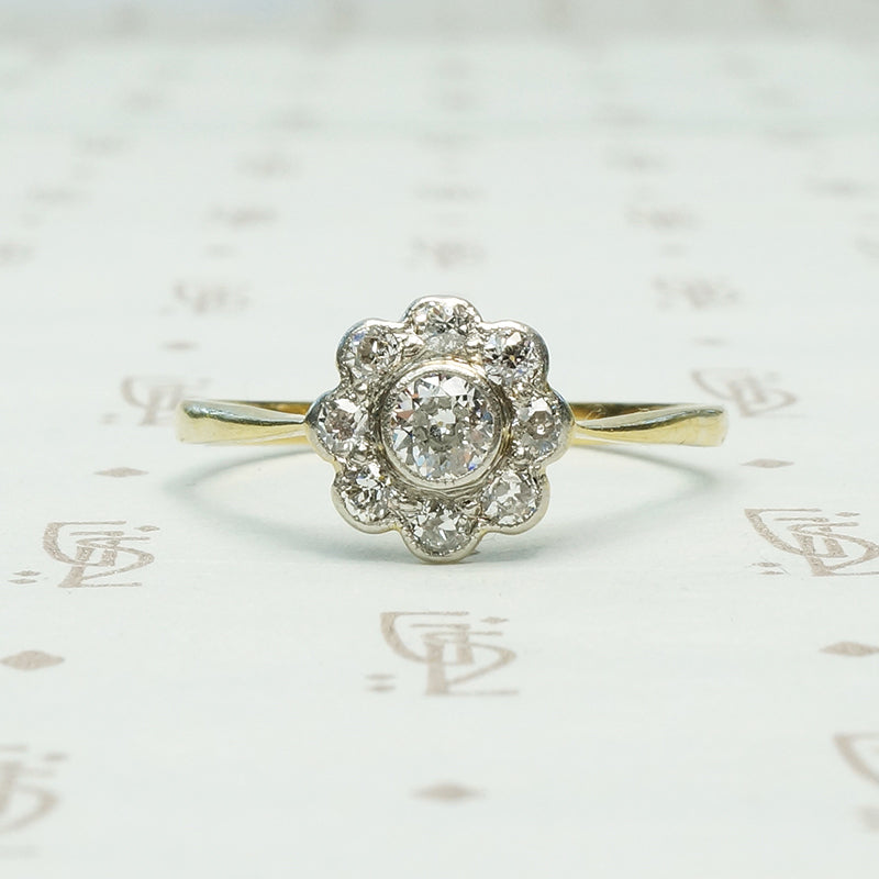Old euro diamond set darling daisy halo ring in platinum on 18k yellow gold