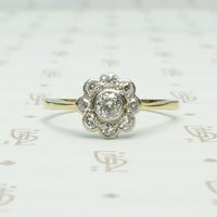 Old euro diamond set darling daisy halo ring in platinum on 18k yellow gold