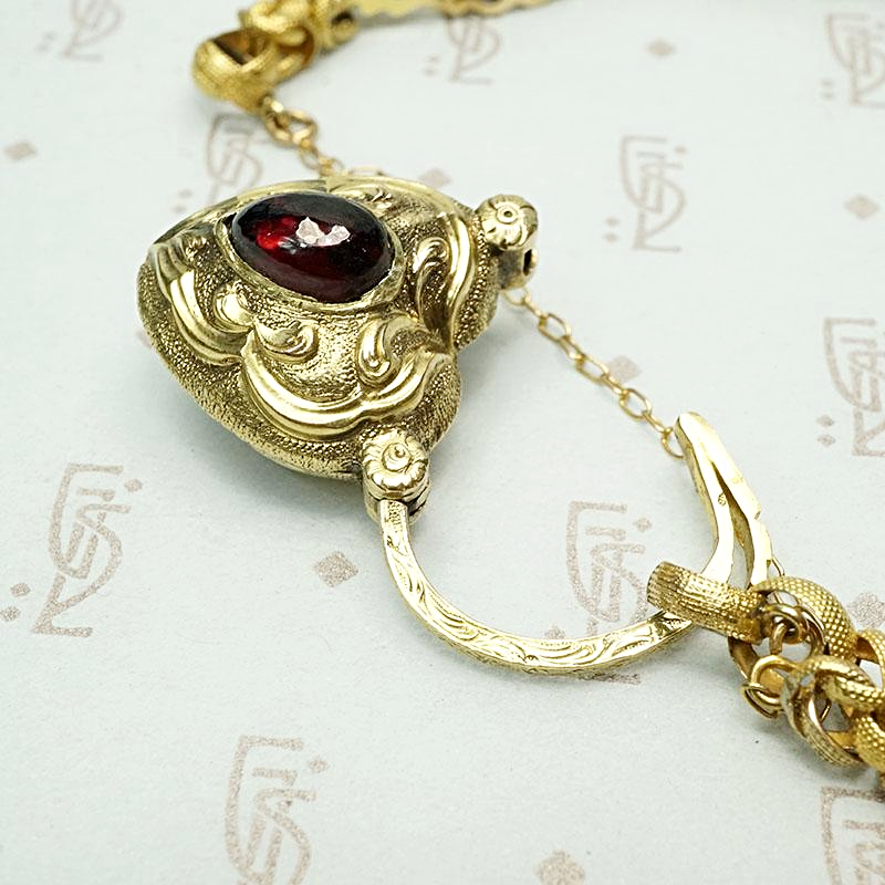 Unbelievable European Heart Lock Bracelet in 18k & Garnet