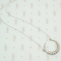 The White Gold Diamond Crescent Moon Necklace