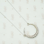 The White Gold Diamond Crescent Moon Necklace