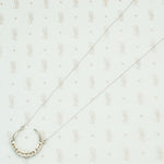 The White Gold Diamond Crescent Moon Necklace
