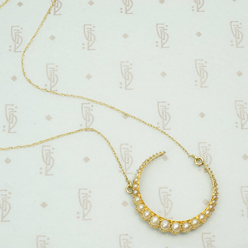 The 18k Gold and Pearl Crescent Moon Necklace