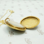 Elevated Victorian Horseshoe Locket, side view