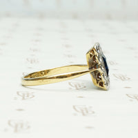 Beautifully Framed Sapphire and Diamond Ring