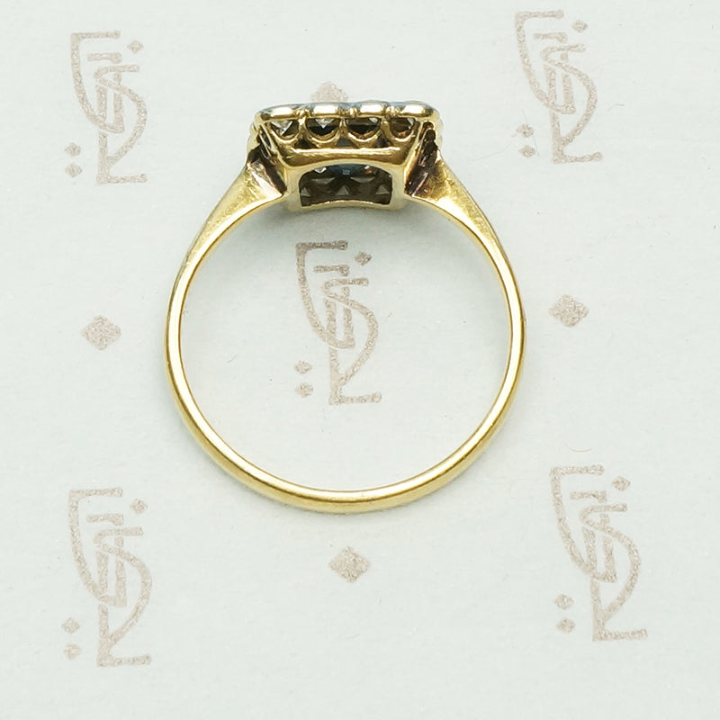 Beautifully Framed Sapphire and Diamond Ring