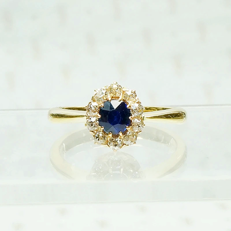 sapphire and diamond halo in 18k yellow gols circa 1950