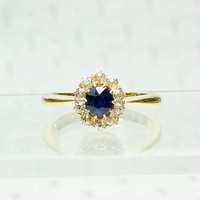 sapphire and diamond halo in 18k yellow gols circa 1950