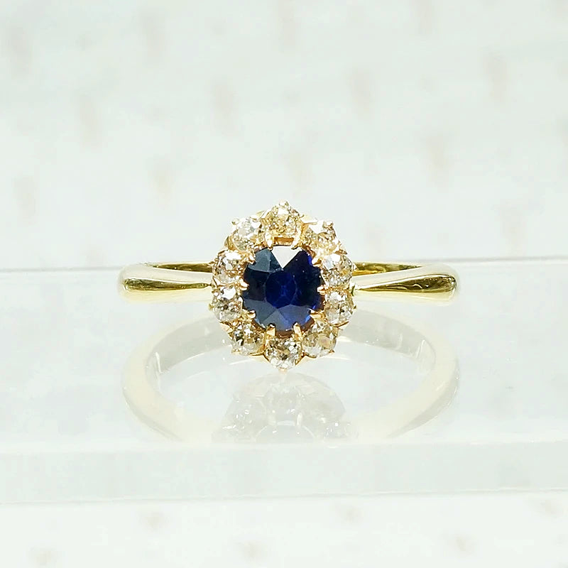 sapphire and diamond halo in 18k yellow gols circa 1950