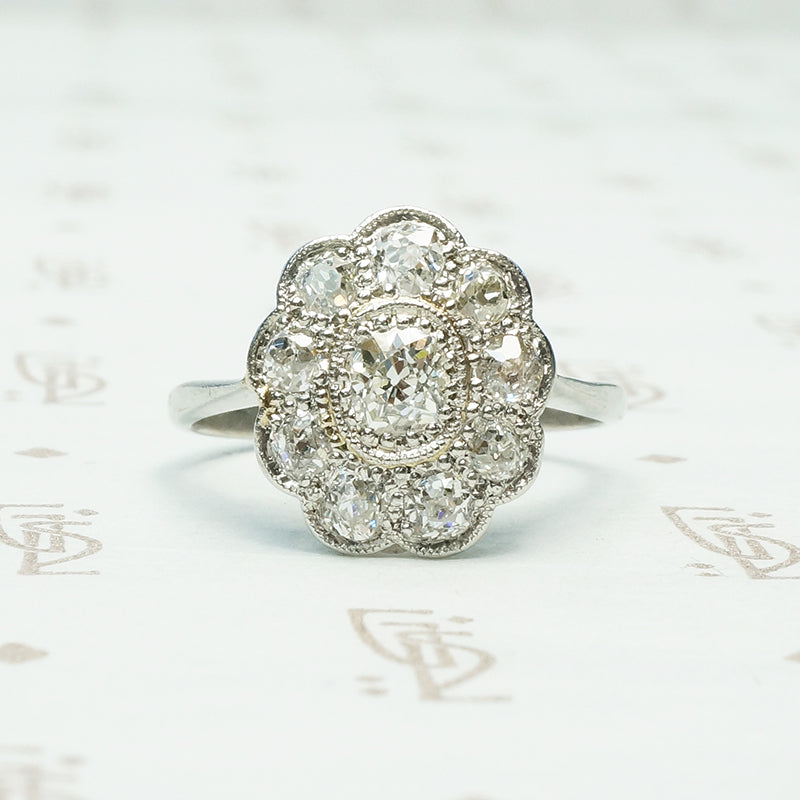 stunning platinum diamond halo ring circa 1910 with .75 tcw of diamonds