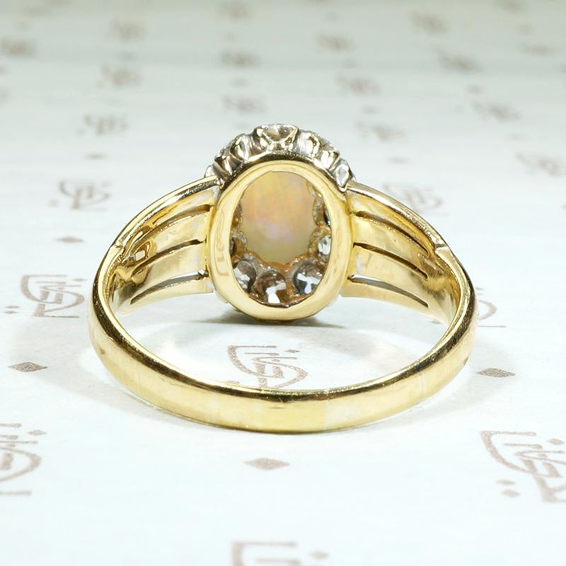 Colorful Opal in Old Mine Cut Diamond Halo Ring