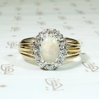 Colorful Opal in Old Mine Cut Diamond Halo Ring